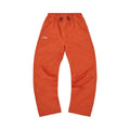 Corteiz Gutta Waterproof Bottoms Burnt Orange – hlavní pohled | Purekickz