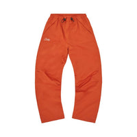 Corteiz Gutta Waterproof Bottoms Burnt Orange – hlavní pohled | Purekickz
