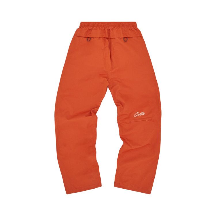 Corteiz Gutta Waterproof Bottoms Burnt Orange – boční pohled | Purekickz