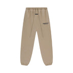 Fear of God Essentials Fleece Sweatpant 'Desert Sand' – hlavní pohled | Purekickz