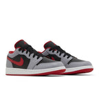 Jordan 1 Low Cement Fire Red (GS) – lifestyle foto | Purekickz